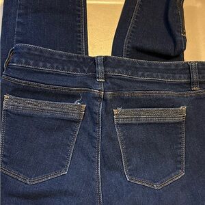 White black market size 2 skinny jeans with zippers on  bottom of the legs